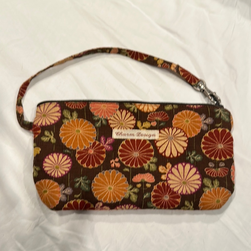 Multicolor, brown and peach wristlet